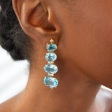 52.858ct Sky Blue Topaz Brown Diamond 18K Earrings