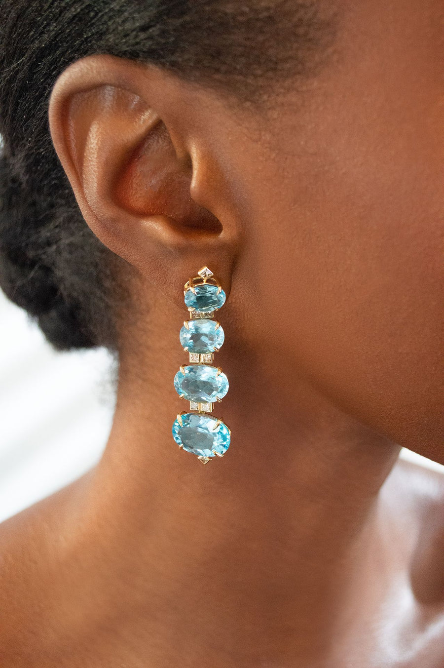 52.858ct Sky Blue Topaz Brown Diamond 18K Earrings